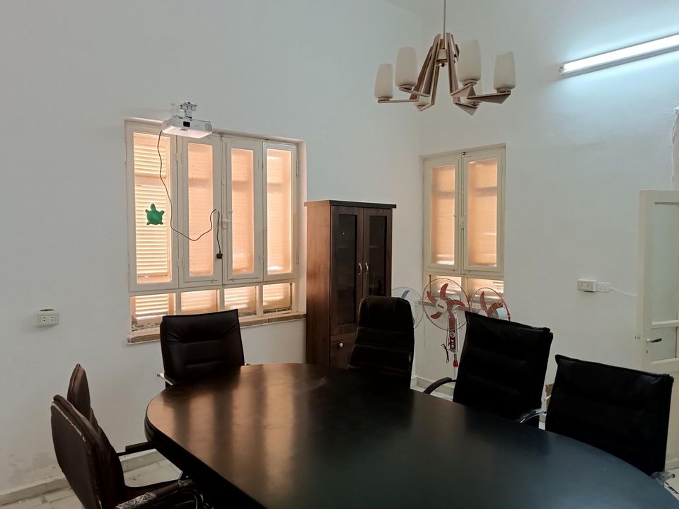 The meeting room around a central table